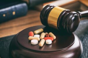judge-gavel-and-drugs-on-a-wooden-desk-2021-08-26-16-34-03-utc.jpeg judge-gavel-and-drugs-on-a-wooden-desk-2021-08-26-16-34-03-utc.jpeg