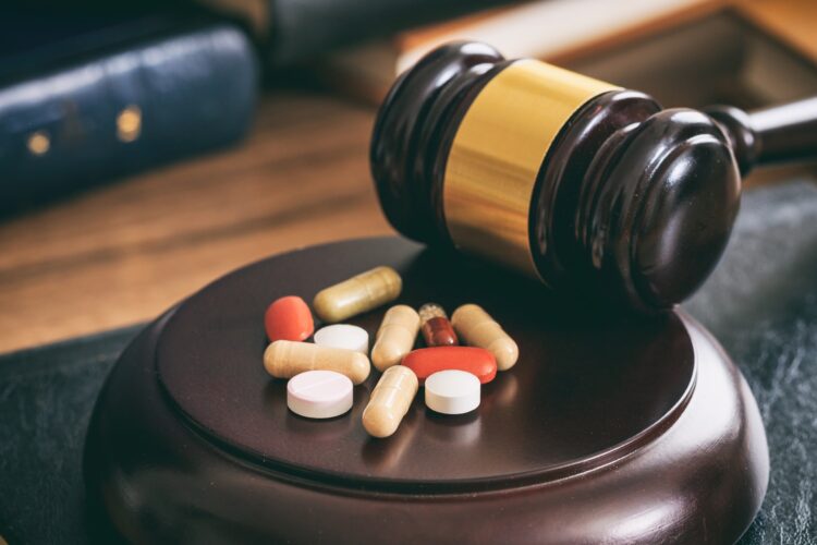 judge-gavel-and-drugs-on-a-wooden-desk-2021-08-26-16-34-03-utc.jpeg judge-gavel-and-drugs-on-a-wooden-desk-2021-08-26-16-34-03-utc.jpeg