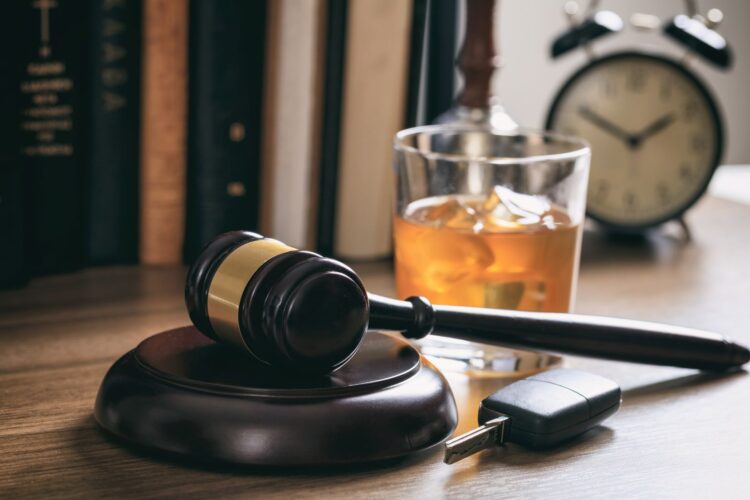 law-gavel-alcohol-and-car-keys-on-a-wooden-desk-da-P36F379.jpg